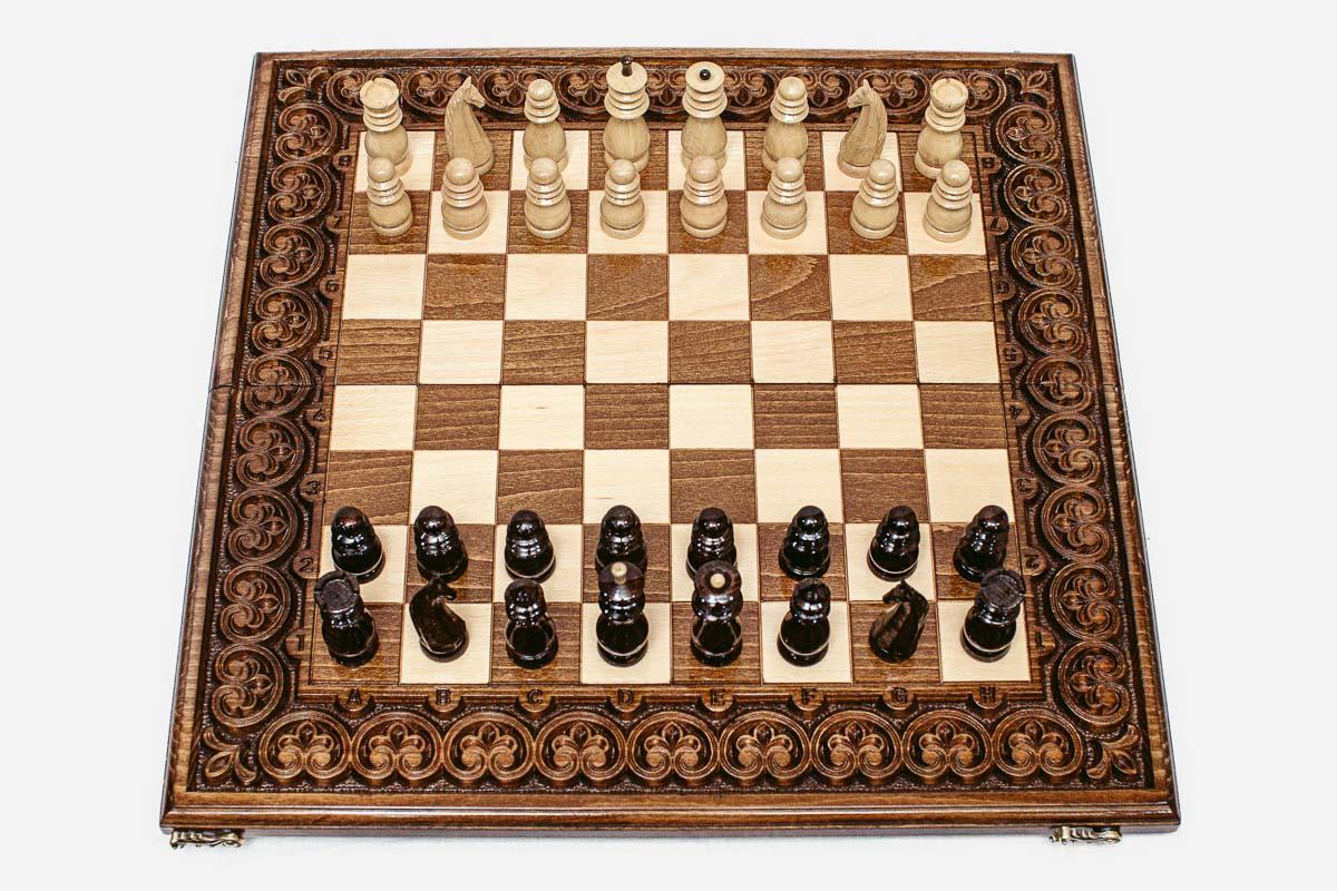 Luxury chess set with hand-carved floral ornament border