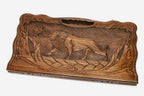Angled view of the lion and octagon carved backgammon board