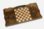 Angled view of the two deer carved backgammon board