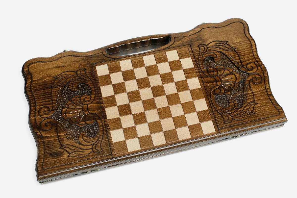 Angled view of the two deer carved backgammon board