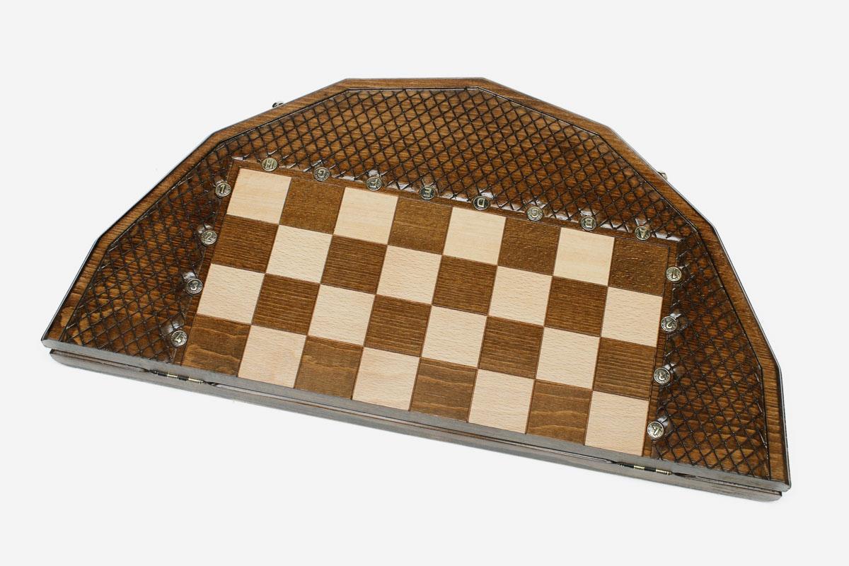 Detail of the turned chess pieces on the maple and walnut inlaid squares
