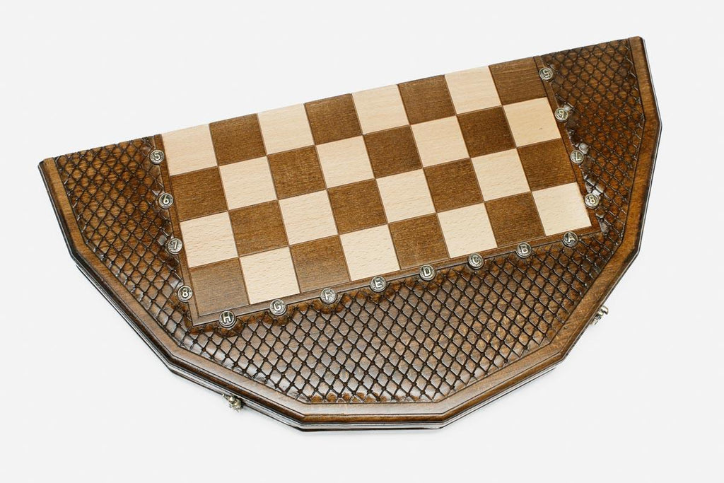 The sixteen-sided board shown half-open, revealing the shape of its cut edges
