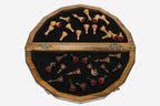 Overhead view of the polygonal board with the full set of 32 pieces