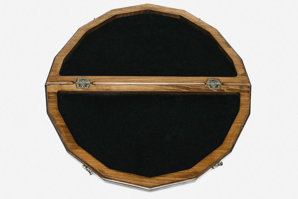 Close-up of the hand-carved lattice border and the board coordinates