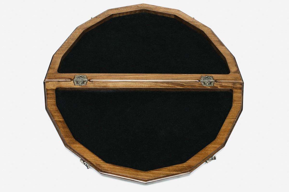 Close-up of the hand-carved lattice border and the board coordinates