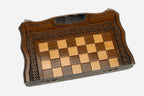 Compact lattice chess and backgammon set shown folded