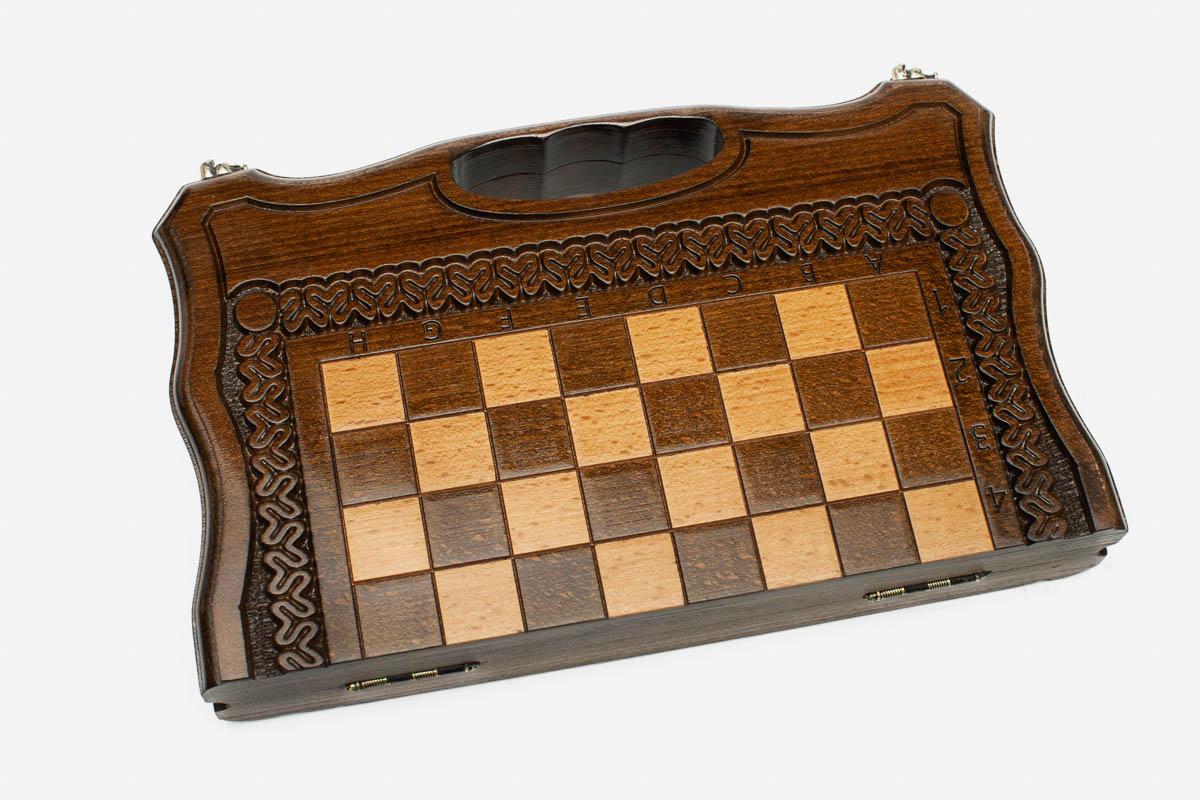 Compact lattice chess and backgammon set shown folded