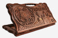 Carved beechwood backgammon board with the Armenian coat of arms and Russian landmarks, propped open
