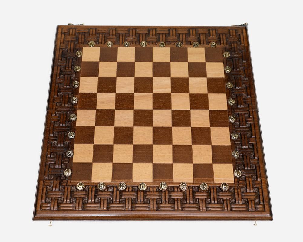 Hand-cut lattice covering the wooden chess board frame