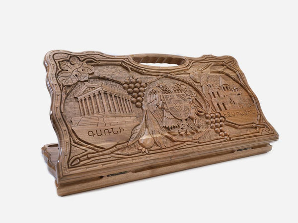 Carved walnut backgammon board with Armenian and Russian churches and a carry handle, propped open