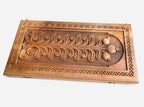 The backgammon board opened to show the wooden playing surface