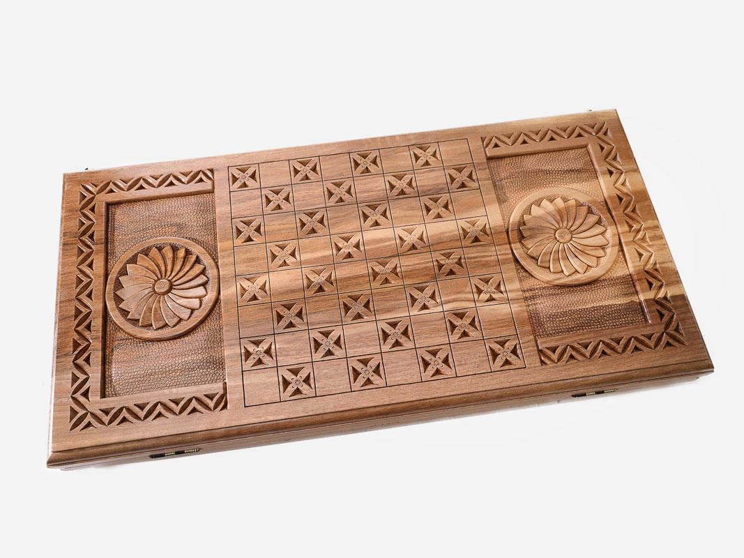 Angled view of the walnut Tree of Life backgammon board