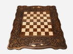 Grapevine and pomegranate wound around the wooden chessboard