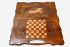 Detail of the scrollwork beside the carved horse