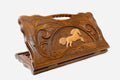Carved beechwood backgammon board with a leaping horse and a carry handle, propped open