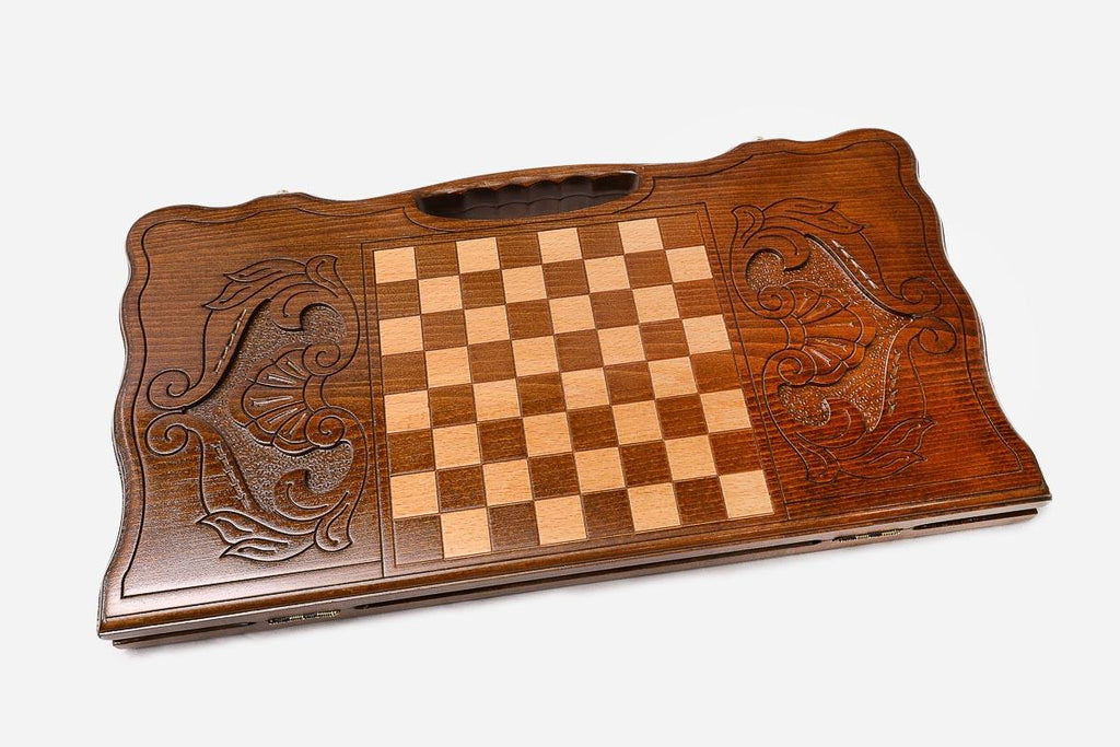 Angled view of the bear family carved backgammon board