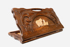 Carved beechwood backgammon board with a bear family and a carry handle, propped open