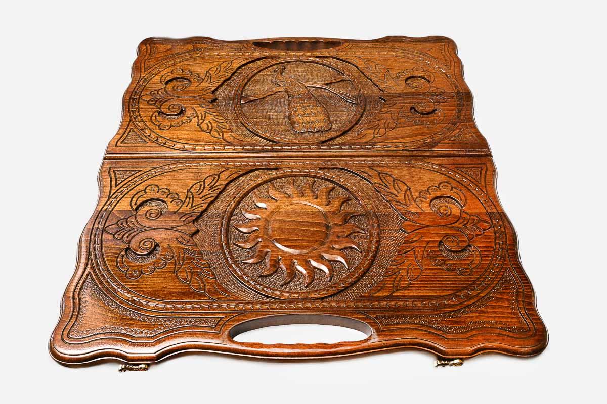 Wooden backgammon set interior with carved points