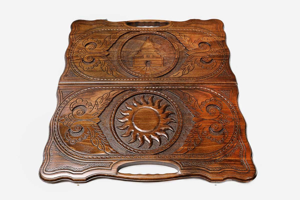 Side view of the folded board with its carry handle