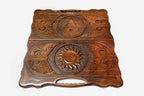Side view of the folded board with its carry handle