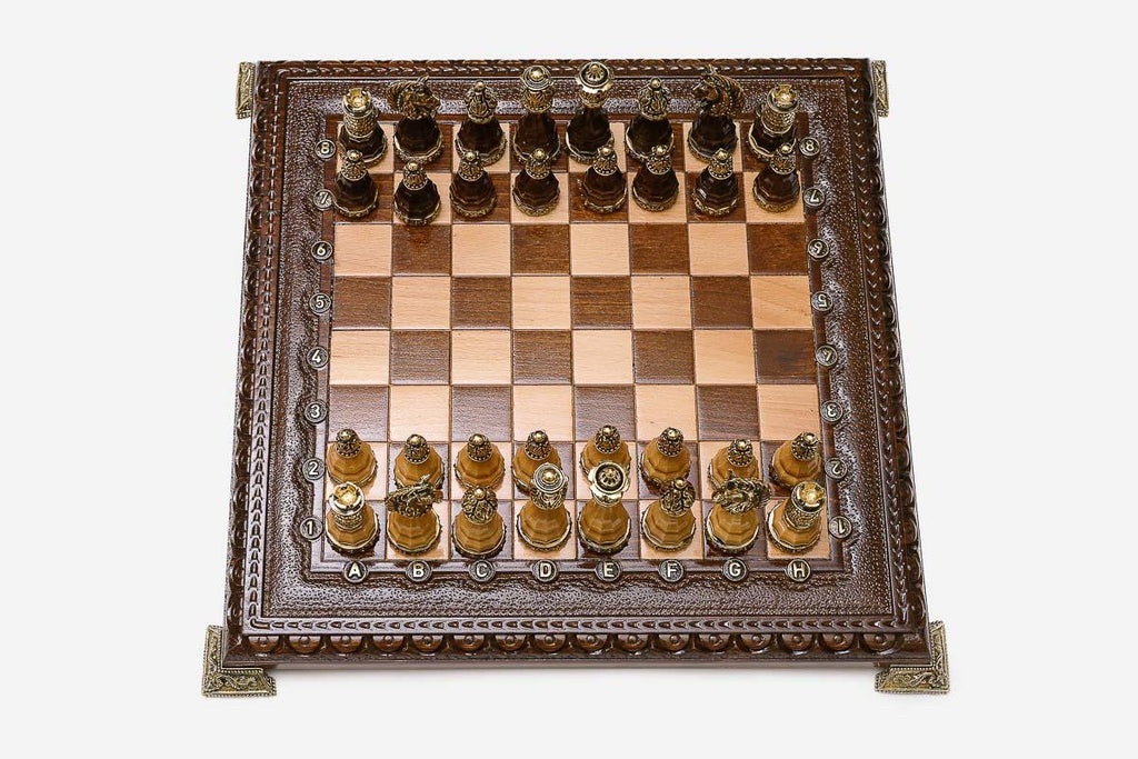 Fine hand-carved chess set shown folded
