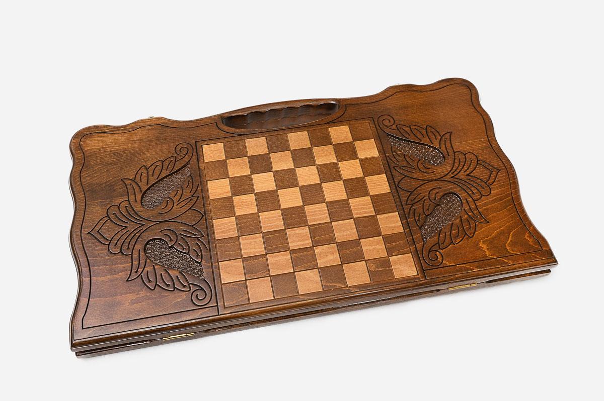 Angled view of the regal lion carved backgammon board