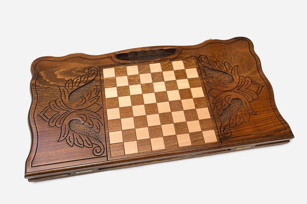 Angled view of the stag carved backgammon board
