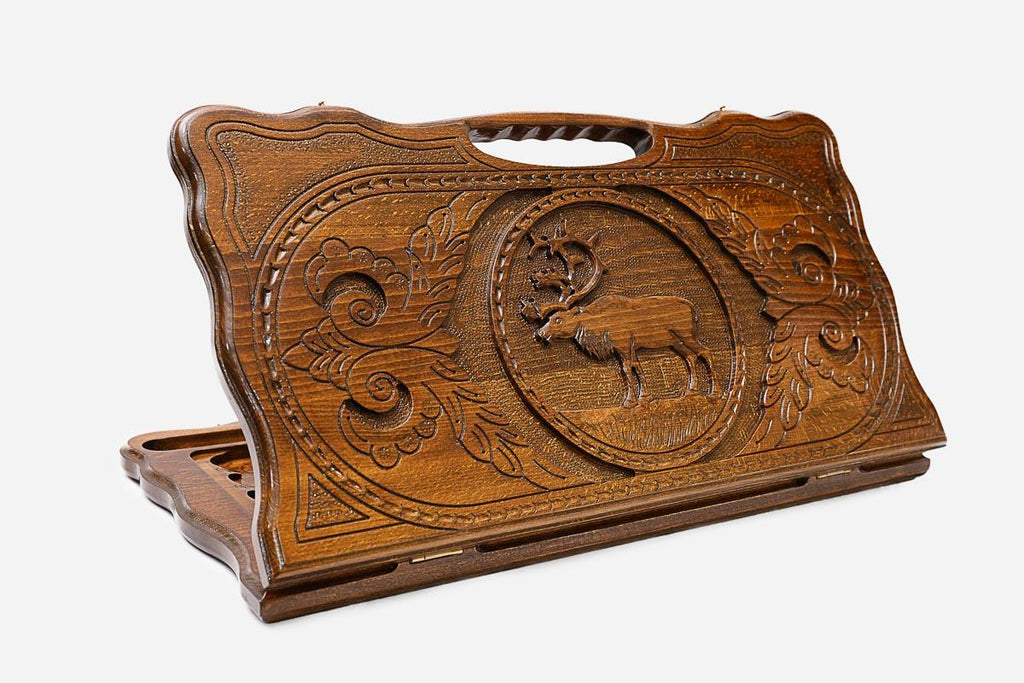 Carved beechwood backgammon board with a graceful stag and a carry handle, propped open