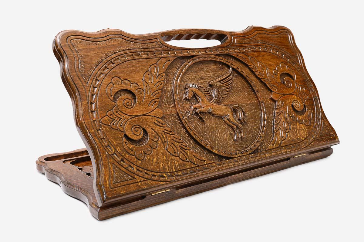Carved beechwood backgammon board with the winged horse Pegasus and a carry handle, propped open