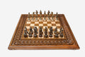 Luxury chess set with carved rope border and bronze pieces