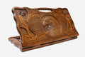 Carved beechwood backgammon board with an eagle between carved stars, propped open