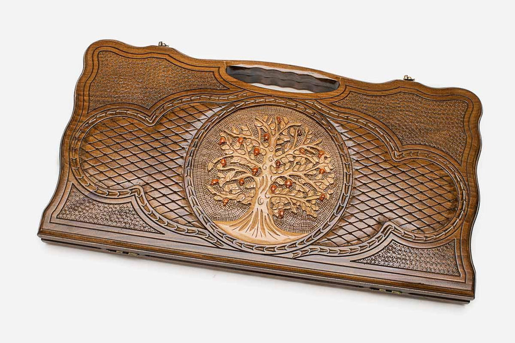 The backgammon board opened to show the wooden playing surface