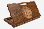 Carved beechwood backgammon board with a Tree of Life bearing red fruit, propped open
