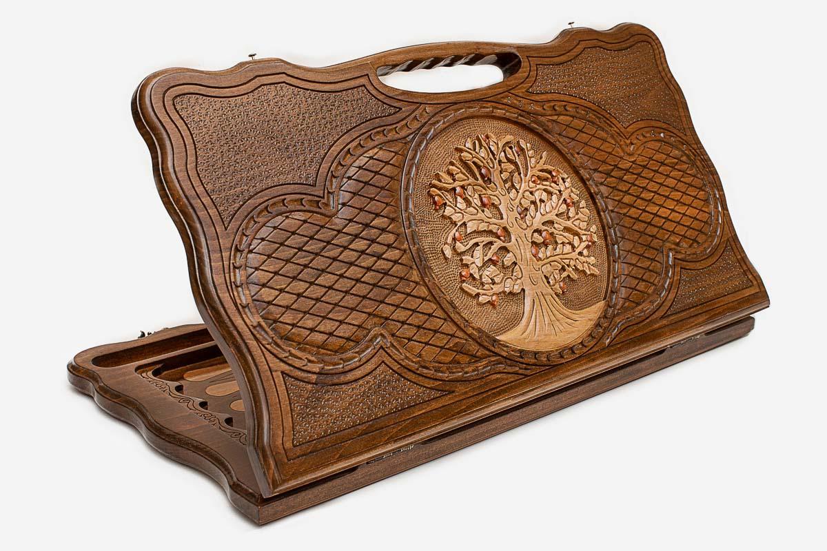 Carved beechwood backgammon board with a Tree of Life bearing red fruit, propped open