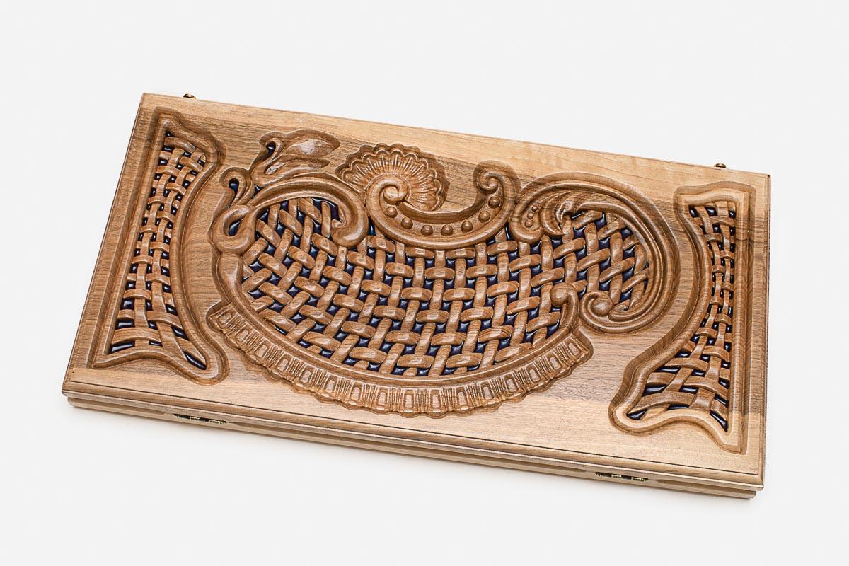 The board opened to show the walnut backgammon interior with playing points