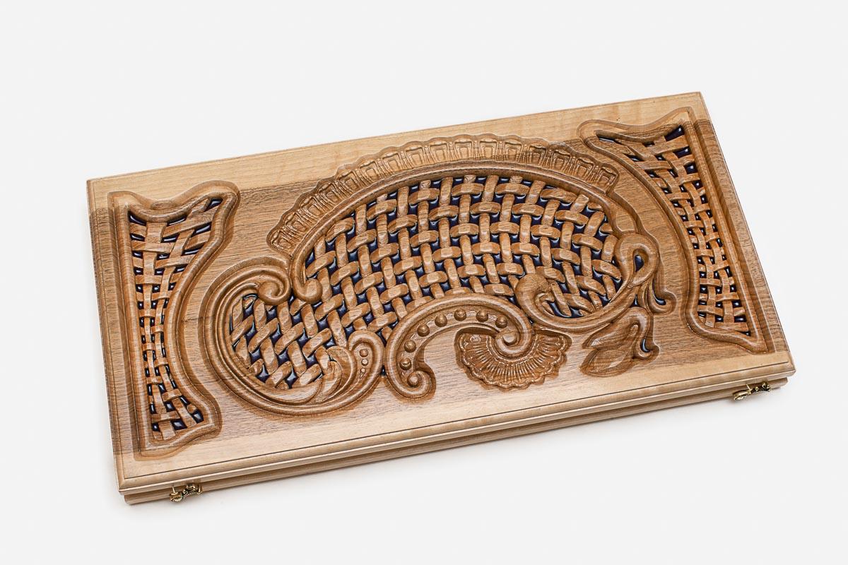 Angled view of the carved lattice epoxy backgammon board