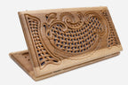 Folding walnut backgammon board with a hand-carved woven lattice panel over blue epoxy, propped open