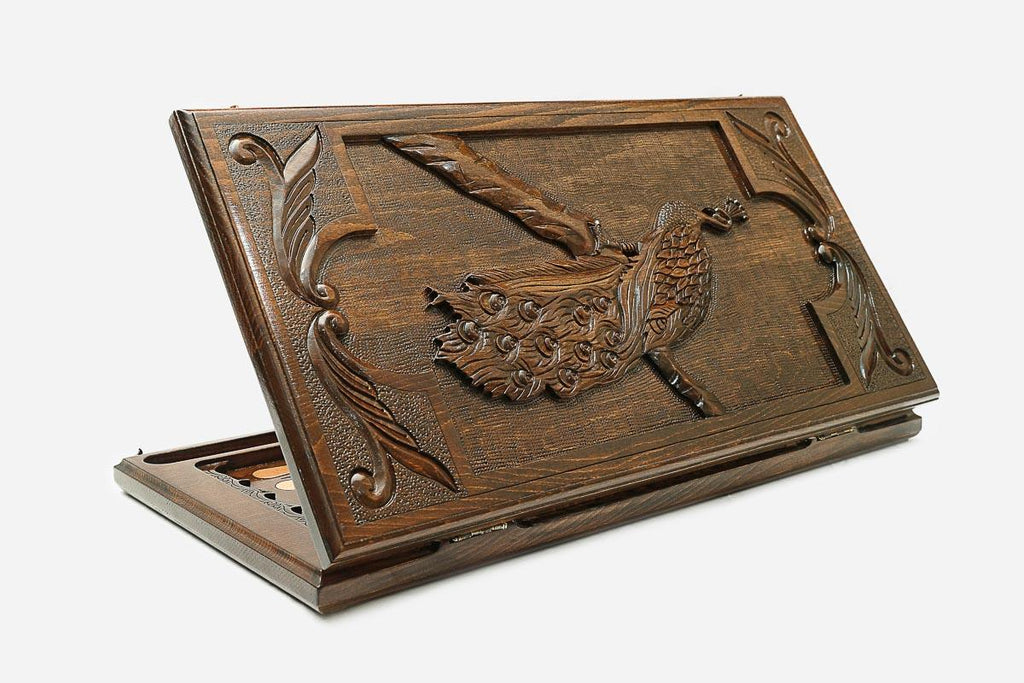 Wooden backgammon set hand carved with a peacock in full display