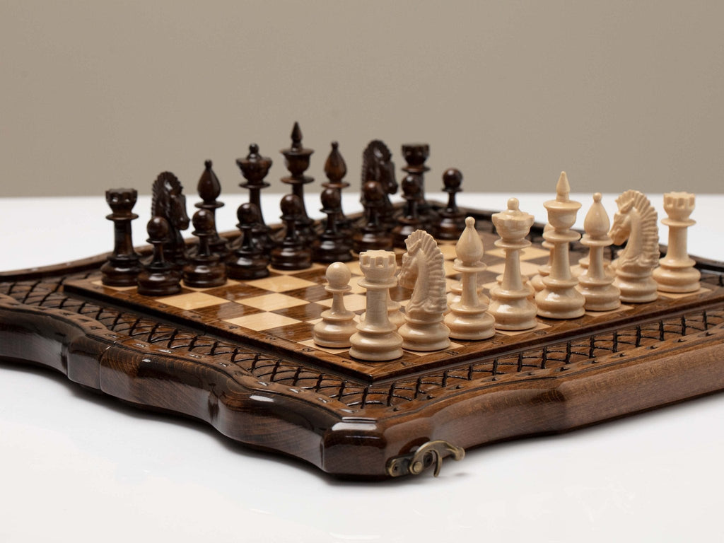 Close-up of the carved wooden chess pieces
