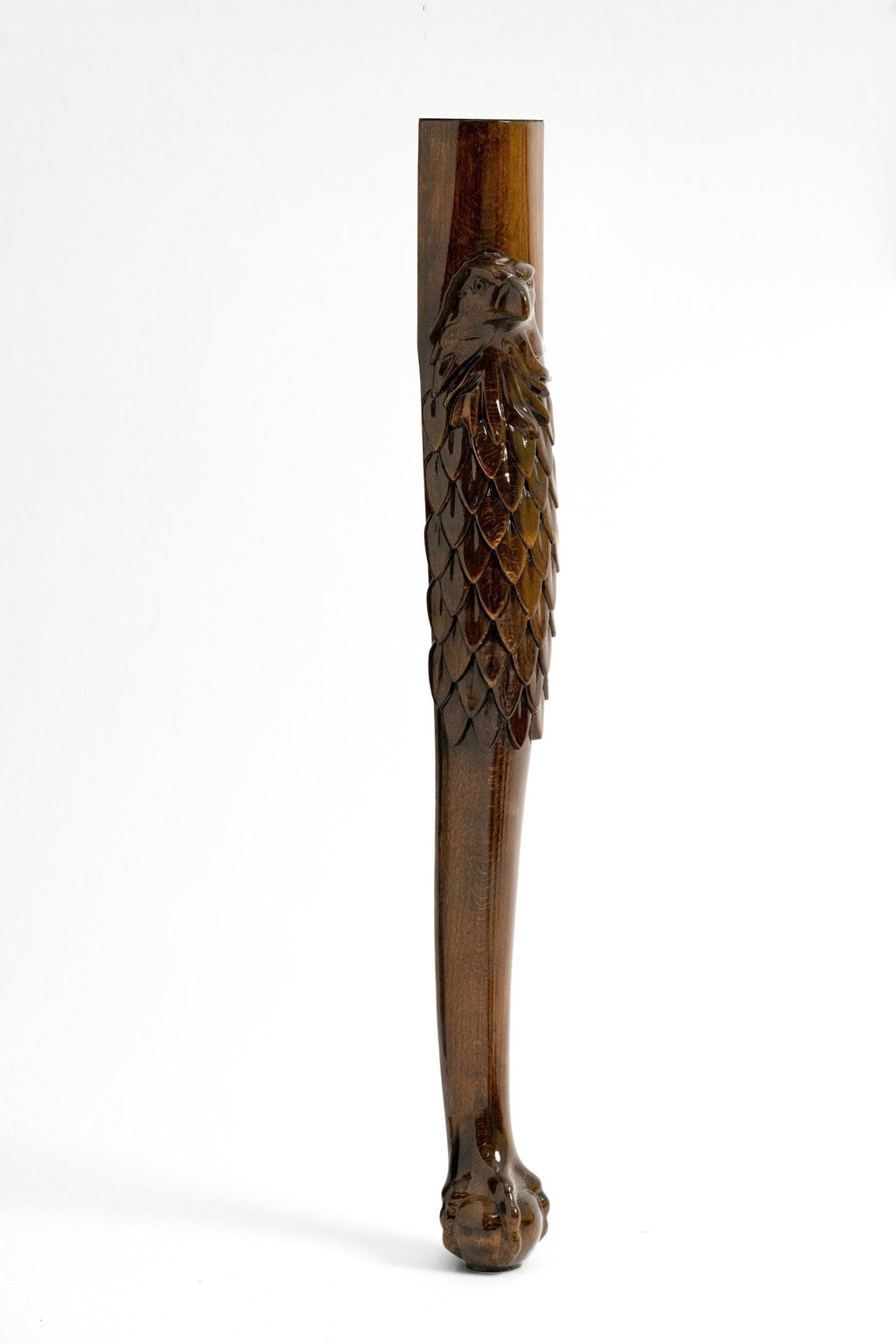 Carved eagle accents on the luxury chess table