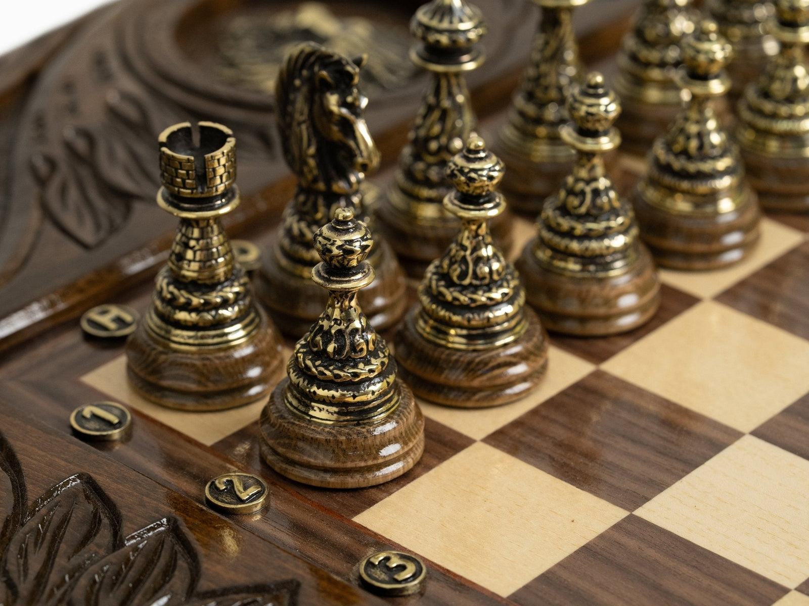 Carved lion accents on the luxury chess table