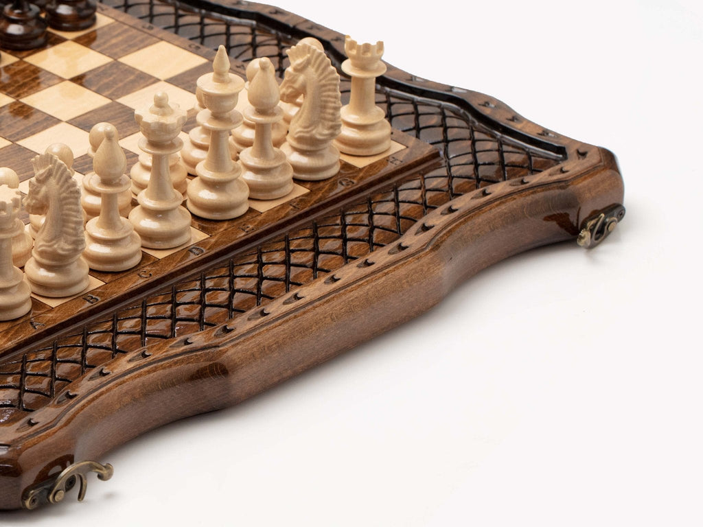 Carved wooden chessboard with detailed border carving