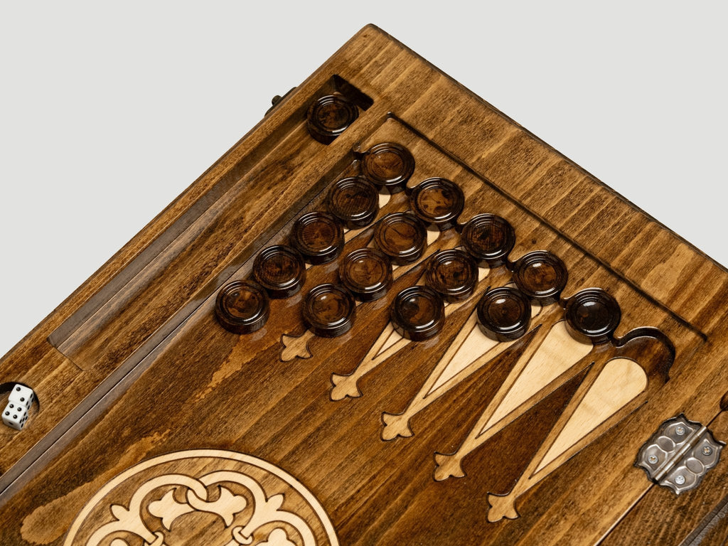 Armenian backgammon set with carved tree design, closed view
