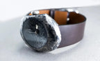 Unisex blackened silver watch on wrist