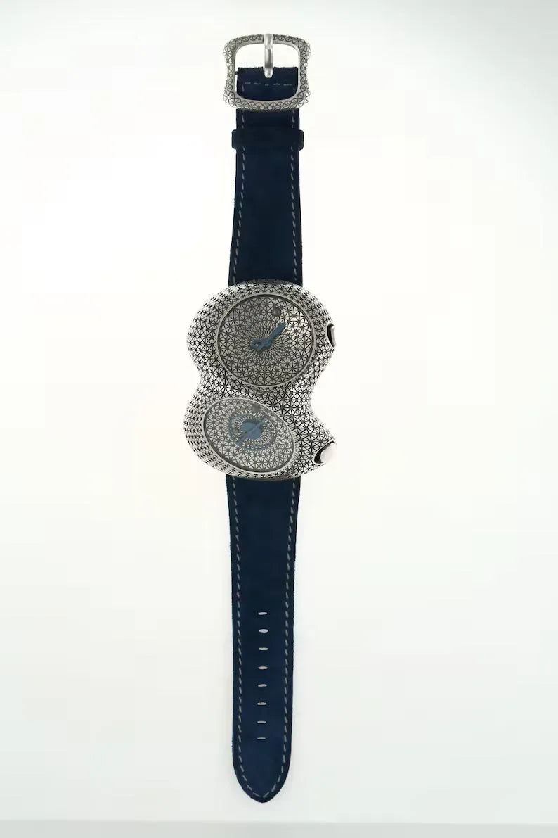 Sterling silver guilloche watch close-up