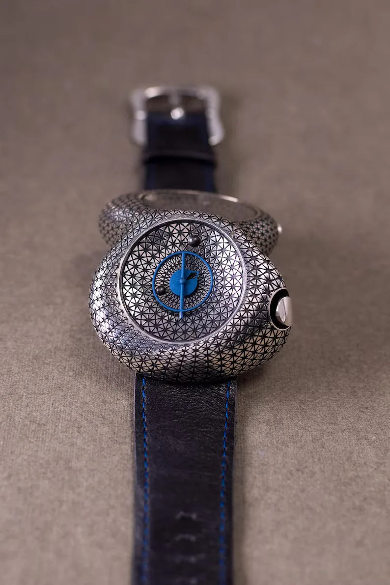 Guilloche dial silver watch with leather strap