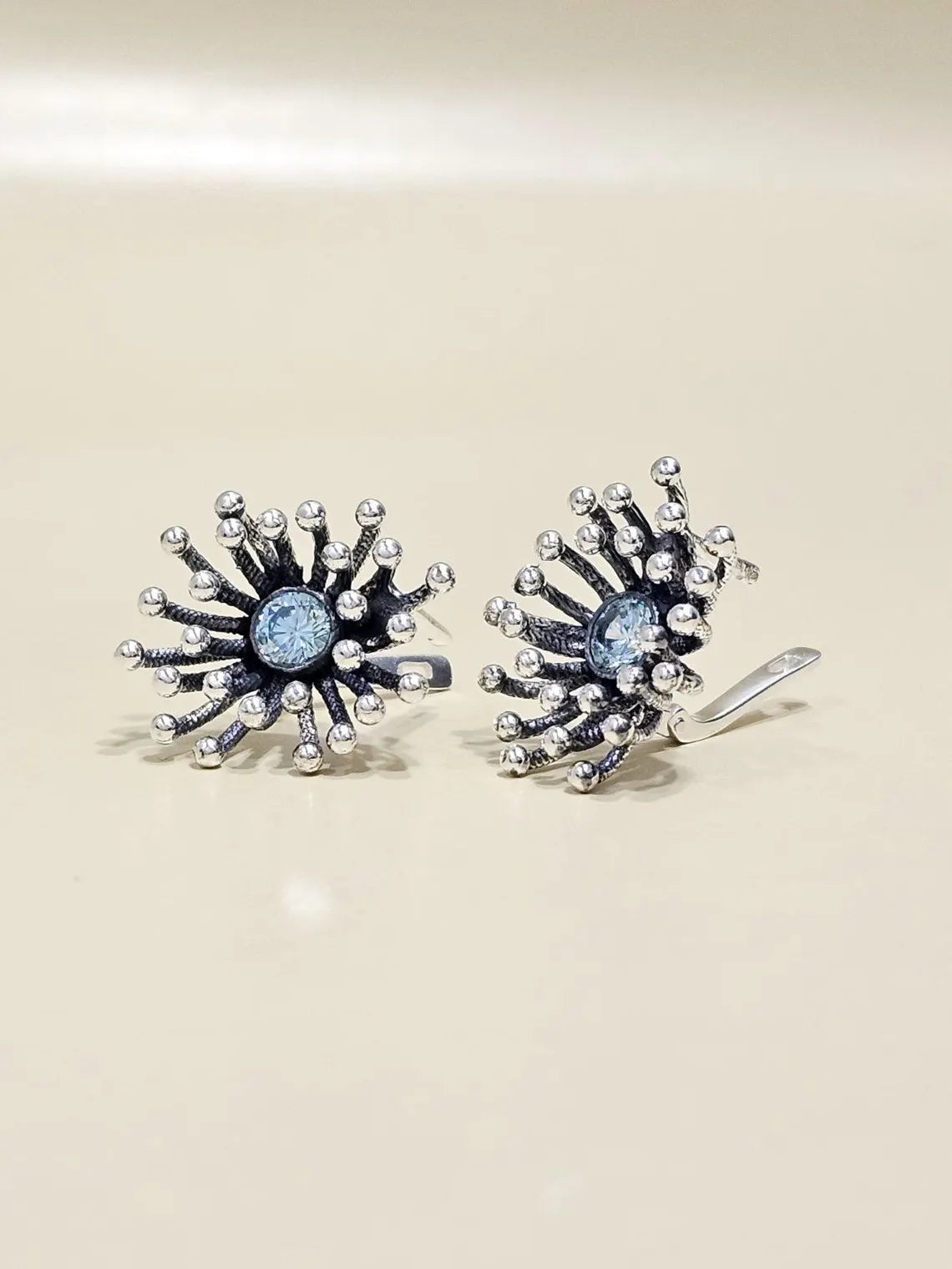 Dandelion sterling silver lever-back earrings with blue gemstones