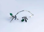 Handcrafted sterling silver bamboo ear climber with green stone