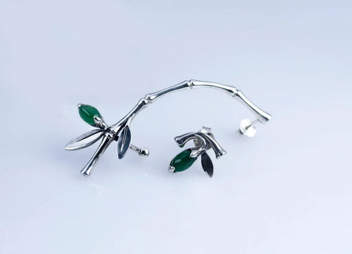 Handcrafted sterling silver bamboo ear climber with green stone