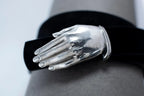 Unique artisan leather belt with sculpted sterling silver hand design